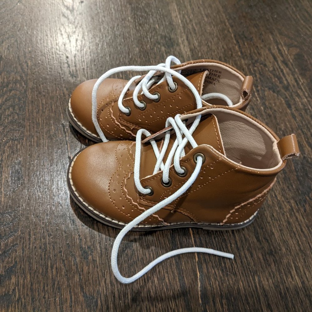 size 7 (Run Small) Very Cute, but didn't fit. $55 PP